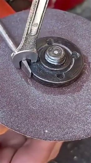remove the grinder bit locking bolt with simple tools#youtubeshorts #skills