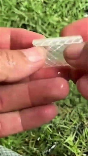 Cutting a section of plastic pipe to create a connection for the flow of water from the pipe faucet