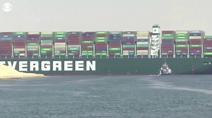 A cargo container ship that's among the largest in the world has turned sideways and blocked all traffic in Egypt's Suez Canal. Recordings show the position of the ship and the traffic jam caused by it. https://cbsn.ws/3sj4xj4 | CBS News