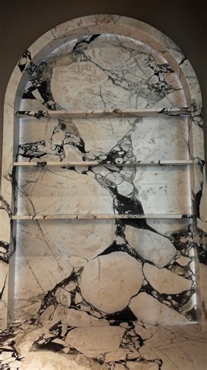 il granito on Instagram: "Backlit beauty unlocked! This Calacatta Viola backsplash isn’t just installed — it’s glowing. The perfect finishing touch to this custom bar setup!"