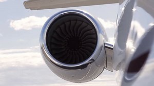 Closeup high detailed view turbo engine rotation of airplane at airport