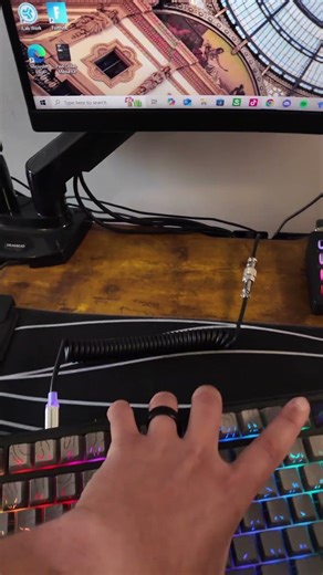 The MAMBASNAKE 01 Ultra RGB Coiled Keyboard Cable instantly upgrades your desk with a clean look and