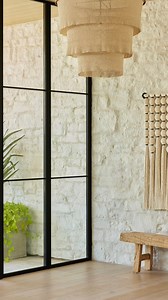 So much incredible detail in the entry foyer in hallway. One of our favorite items is the board formed concrete wall. | AFT Construction