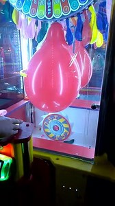 dave buster balloon pop