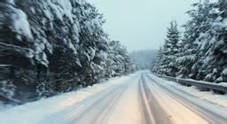 Pov car drive over snowy forest on winter roadtrip to the nordic way