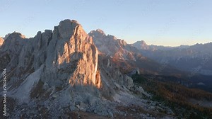 4k drone flight back footage (Ultra High Definition) of Ra Gusela peak. Fantastic autumn scene of Dolomite Alps, Belluno province, Italy, Europe. Traveling concept background.