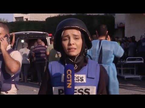 CGTN correspondent breaks down in tears while reporting in Gaza
