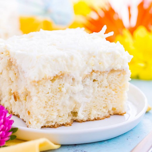 This COCONUT POKE CAKE is easy to make, loaded with coconut flavor, and the perfect dessert for your spring and summer celebrations. RECIPE >>> https://www.sugarandsoul.co/coconut-poke-cake-recipe/ | Sugar & Soul