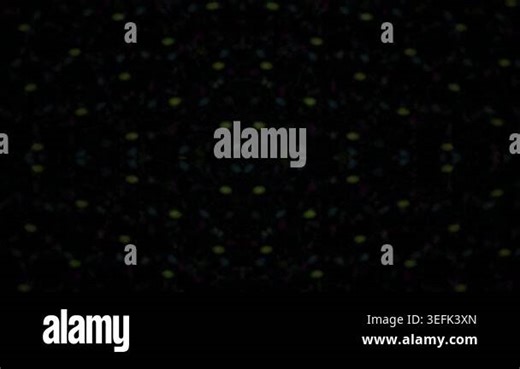 Abstract animation of floating digital particles creating a soft glowing pattern against a dark background Stock Video Footage - Alamy