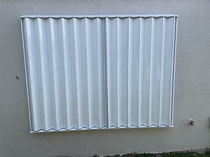 Accordion Shutters vs Roll-Up Shutters — Johnson Aluminum Products