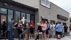 State’s first marijuana dispensary opens to cheering crowd