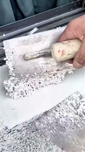 Applying Textured Finish Coating With a Trowel to an Exterior Wall