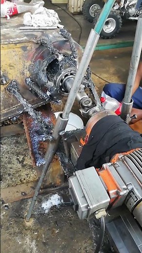 REPAIRING EXCAVATOR'S DIPPER STICK WITH MIG WELDS BUILD UP AND LINE BORING MACHINING IN WORKSHOP