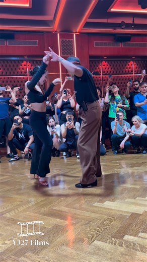 YJ27 Films on Instagram: "Watching Adolfo Indacochea and Nathalia Raigosa break down spin technique is a total masterclass in axis and control. Notice how Nathalia maintains her frame through multiple rotations without losing her connection to the music or her partner. Whether you’re a lead or a follow, the secret is in the spotting and the core engagement. This level of precision is exactly what sets the elite apart on the social floor. 🗽 Coming to NYC July 30th to Aug 3? Use my code YJ27 for 