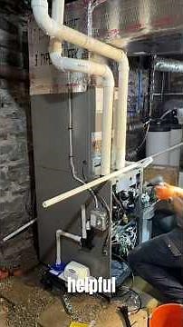 Clean condensate setup on this Lennox furnace—trap, neutralizer pump, and AC drain all dialed in.