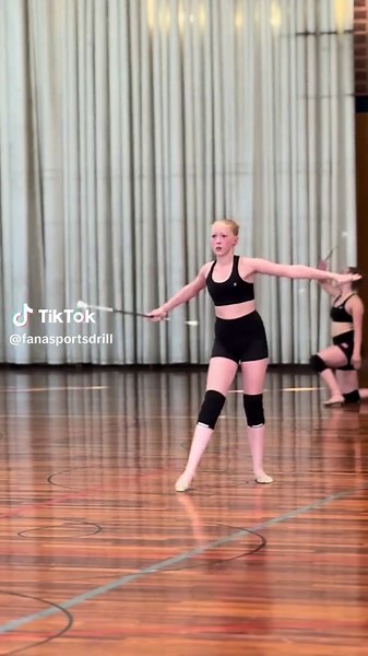 Baton Twirling Techniques Showcased by Maddie