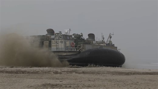 Navy landing craft conduct ship-to-shore operations