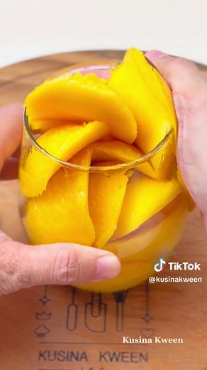 Mango Bango Recipe 🥭✨ Want to make a dessert so good it'll disappear in seconds? Hi Kweenatics, let's whip up the easiest and most refreshing treat—Mango Bango! Perfect for any day, every day! Ingredients: * 6 Ripe Mangoes (cut into cubes) * 2 cups Nata de Coco * 1 cup Small Tapioca Pearls (cooked Sago) * 2 cups Angel Kremdensada (or replace with 1 cup Condensed Milk and 1 ½ cups Heavy Cream if unavailable) * 1 tsp Mango Flavoring (optional) Instructions: 1. Cut mangoes into cubes. Puree one ma