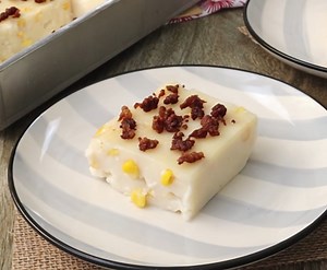 Maja Blanca Espesyal is a Filipino-style coconut pudding made extra delicious with evaporated and condensed milk. Sweet, creamy, and topped with latik, it’s delicious as a snack or dessert. Full recipe: https://www.kawalingpinoy.com/maja-blanca-espesyal/ | Kawaling Pinoy Recipe Blog