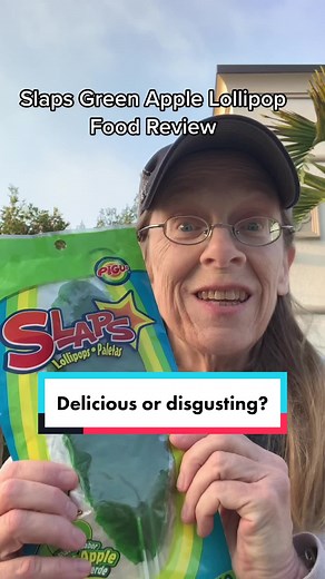 Food review of Slaps green apple fruit leather lollipop. Does is slap? #candy #foodtiktok #foodreview