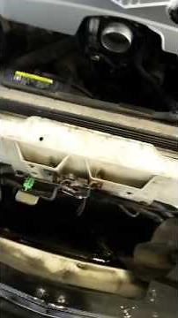 Cadillac STS headlight bulb replacement