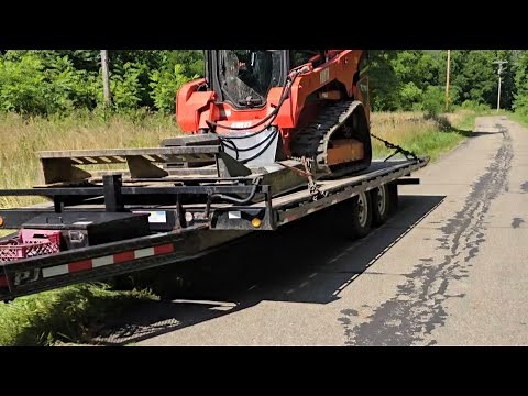 kioti TL750 brush hogging with a wolverine 72 inch brush cutter