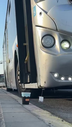 Modern Silver Bus Close-Up View