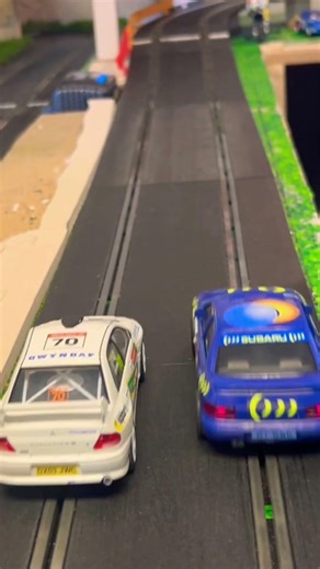Evo vs Scooby #scalextic #race #slotcars #evo #evolution #mitsubishi #wrx #subaru #scooby