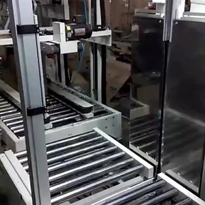 XT-101Y XT-558FD combo sealing and strapping machine for LCD boxes. | Dongguan Xutian Packing Machine Co.,ltd