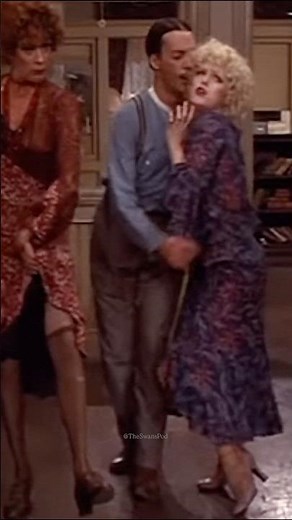 Bernadette Peters, Tim Curry and Carol Burnett performing "Easy Street" in ANNIE (1982).