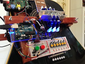 Robotic Player Guitar Rocks Out On Its Own