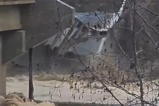 Bridge collapses into river as flooding hits Montana