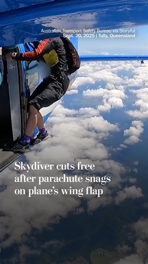 The Australian Transport Safety Bureau shared footage on Dec. 11 of the moment a skydiver cut free after a reserve parachute got caught on the wing flap mid-air. The skydiver was able to release the main parachute, landing with only minor injuries. | Washington Post