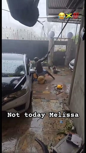 Jamaican attempts to save his roofs in the hurricane #jamaicans #jamaicans #hurricane #flood #shorts