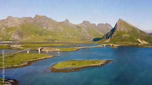 Flying around Fredvang bridges on Lofoten islands in Norway