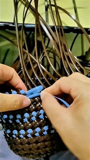 Process of making a basket with plastic ribbon
