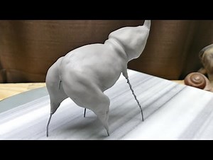 Sculpting an Elephant, part 4: Adding clay to the body
