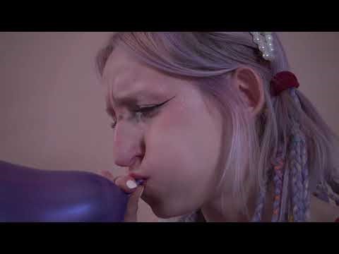 Two Looner Girls Blowing up Balloons with an Accidental Pop