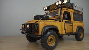 1K views · 148 reactions | This is seriously the most scale RC I've ever unboxed!! My full video review and run of the Camel Trophy Defender 90 from D1RC is now up on YouTube! I was super impressed with the level of detail and quality on this trail truck, and it also comes with decent electronics, lots of metal components and a 2-speed transmission. Do I think it's worth the hefty price tag?? How does it perform? Tune in to the full video: https://youtu.be/bVFhC5hG6ek | RC Girl | Facebook