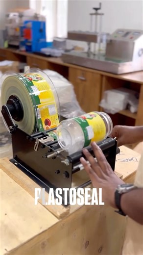 Manual sticker labelling machine for round bottle labelling #labellingmachine