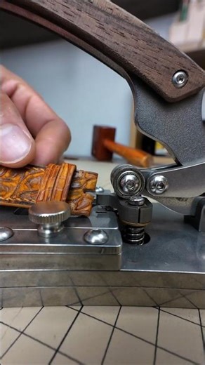 Punch holes, install quick release spring bars, attach a tang buckle on a brown alligator watch band