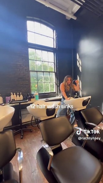 Unique Salon Interior Design with Swing, Chandeliers, and More