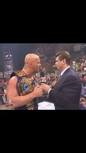 On March 30, 1998 one night after winning the WWF Heavyweight Championship from Shawn Michaels at WrestleMania XIV, Stone Cold Steve Austin is awarded the “new” title on RAW airing live from the Pepsi Arena in Albany, New York. The short-lived belt had the traditional WWF logo at the top of the belt and would later be replaced with the belt with a scratch WWF logo associated with the “Attitude Era.” Austin brought out the old “winged eagle” belt that he had won at WrestleMania XIV before snatchi