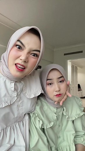 Indoor Interaction in Light-Colored Ruffled Dresses