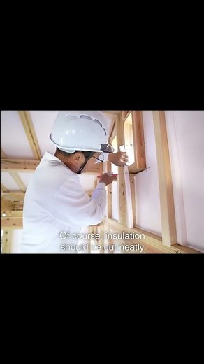 Carpenter Insulates Building