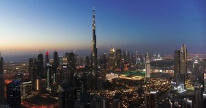 Aerial view of Dubai skyline at night, United Arab Emirates.