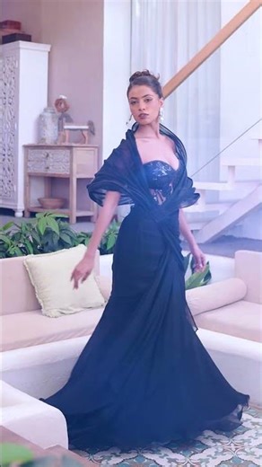 Elegant Black Mermaid Gown with Sculpted Bodice and Dramatic Evening Silhouette. Timeless Black Gown