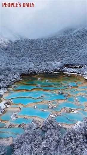 The Huanglong scenic area in southwest China’s Sichuan Province was draped in glistening silver after a recent snowfall, creating a magical winter spectacle for visitors. | VideoChina
