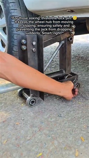 Safety First: The Lock Pin That Keeps Your Jack Secure #JackSafety #WorkshopSafety #DIYgarage