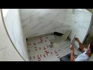 Build your shower without a wall or step. Flat shower base